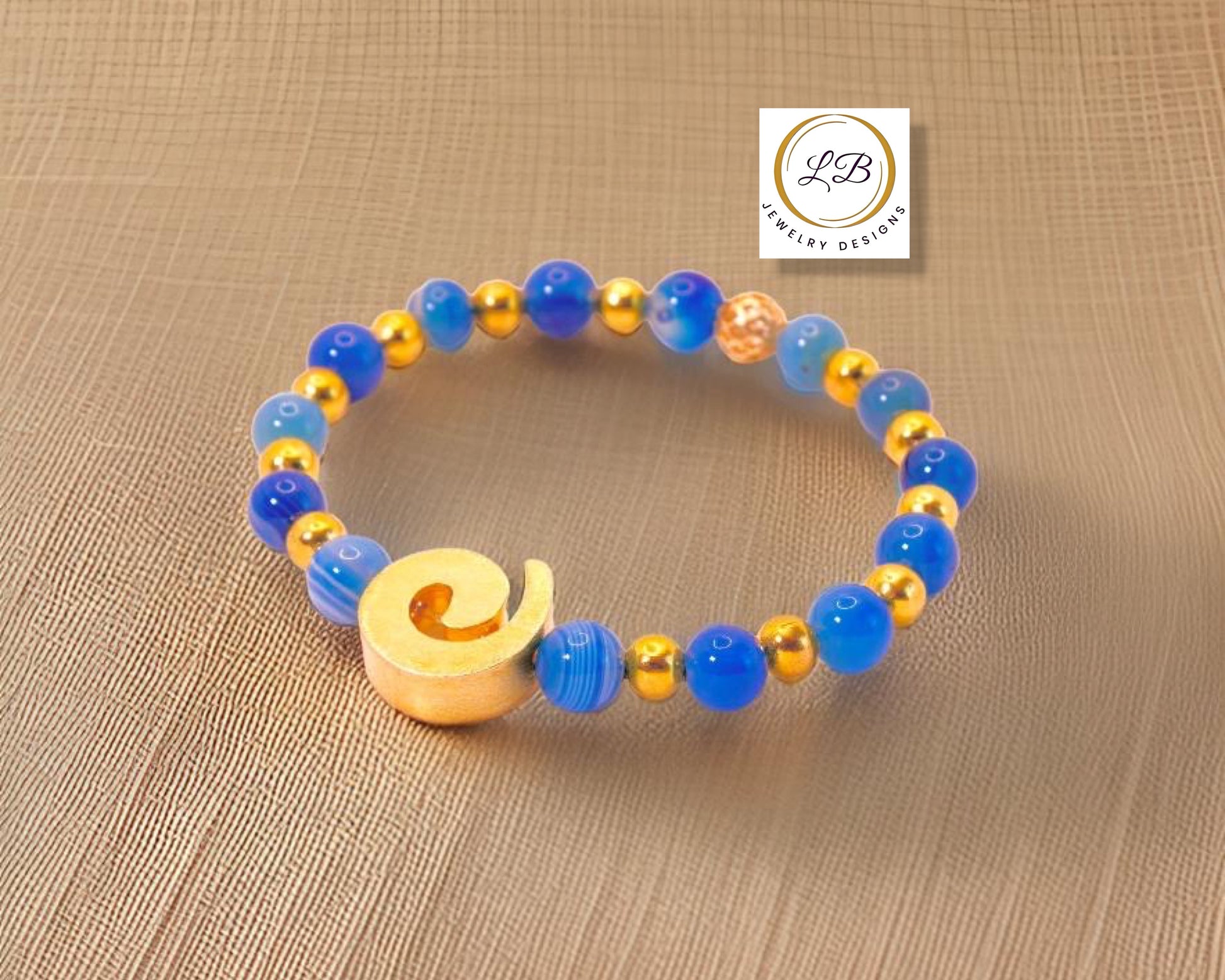 Blue-Banded Agate Gemstone Beaded Bracelet with Gold Swirl Accent